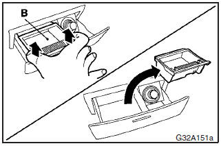 To remove the ashtray, pull up the inner part (B) from the sliding tray.