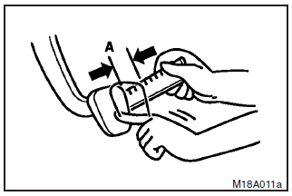 Stop the engine, depress the brake pedal several times, and press down the pedal