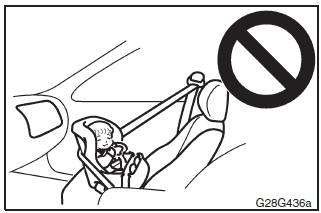 REAR-FACING CHILD RESTRAINTS must NOT be used in the front passenger seat