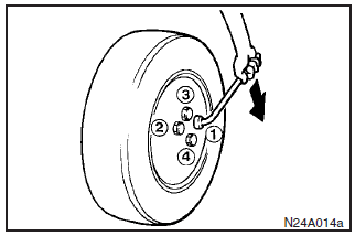 8. Lower the vehicle slowly and then tighten the nuts diagonally in two or three