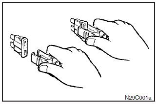 5. Insert a new fuse of the same capacity into the clip and insert the fuse at