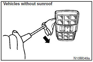 Insert a straight blade (or minus) screwdriver into the notch of the lamp assembly