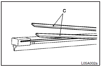 3. Attach retainers (C) to a new wiper blade. 4. Insert the wiper blade into