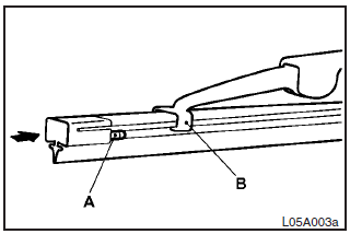 5. Push the wiper blade until the hook (B) engages securely with the stopper