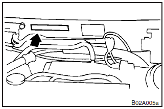 The chassis number is stamped on the bulkhead as shown in the illustration.