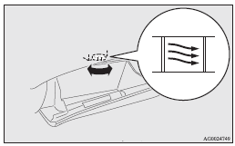 2. Turn the air conditioning temperature control dial (A) to the desired temperature.