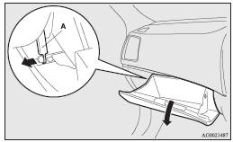 3. While pressing the side of the glove box, unhook the left and right hooks