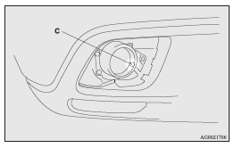 3. While holding down the tab (D), pull out the socket (E).