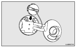 5. Insert the gun in the tank port as far as it goes.