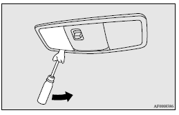 2. While holding down the tab (A), pull out the bulb.