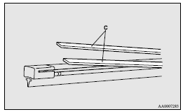 4. Insert the wiper blade into the arm, starting with the opposite end of the