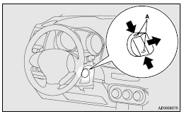 7. Insert the emergency key into the ignition switch.