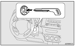 8. Insert the keyless operation key into the emergency key.