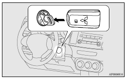 9. After turning the emergency key with the keyless operation key to the “ON”