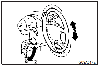 To adjust the steering wheel height, release the tilt lock lever while holding