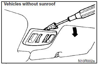 Insert a straight blade (or minus) screwdriver into the notch of the lamp assembly